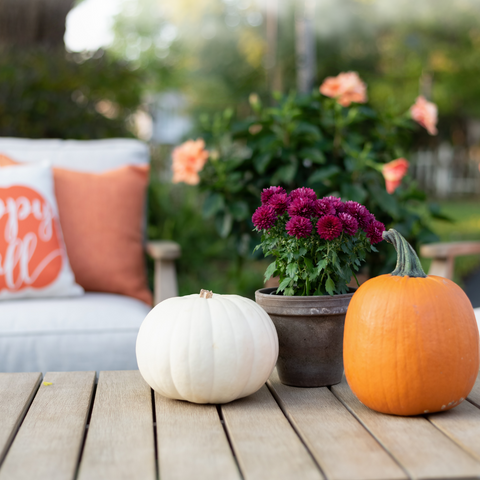 Pumpkins on a porch fall decor